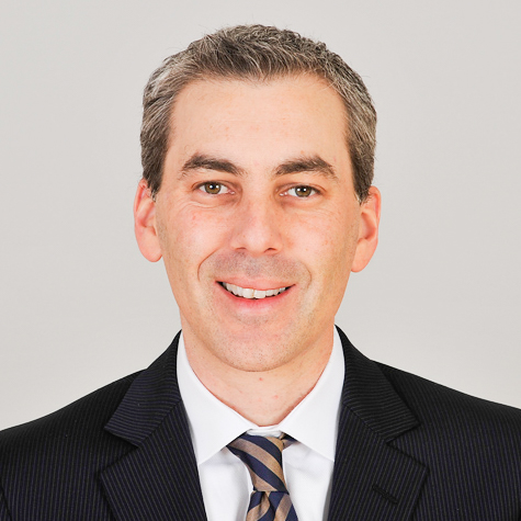 Headshot photo of Kevin Demoff smiling