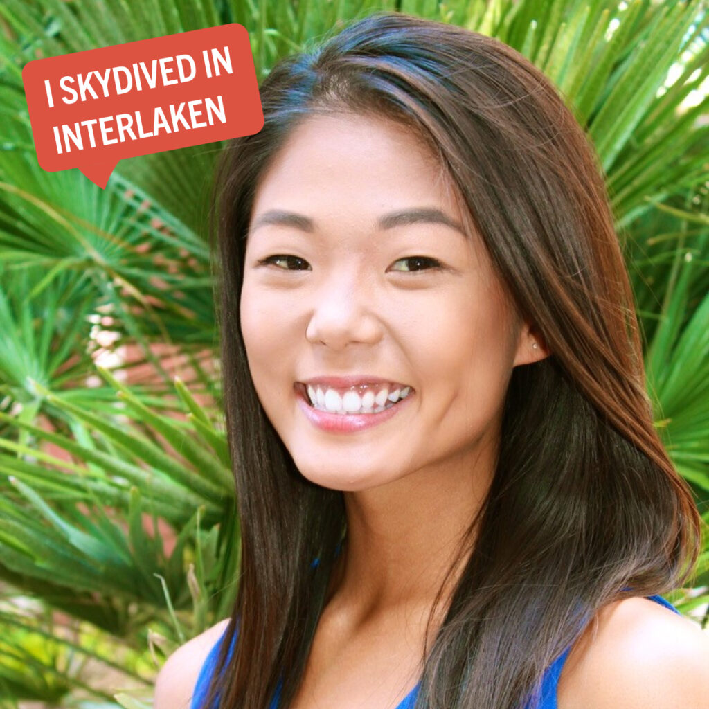 Portrait of Jennifer Yi with a colorful tag displaying their fun fact "I skydived in Interlaken"