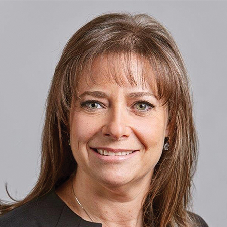 Headshot photo of Stefanie Kane smiling