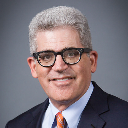 Headshot photo of Mark Louchheim smiling