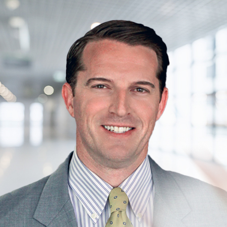Headshot photo of Marc Hickman smiling