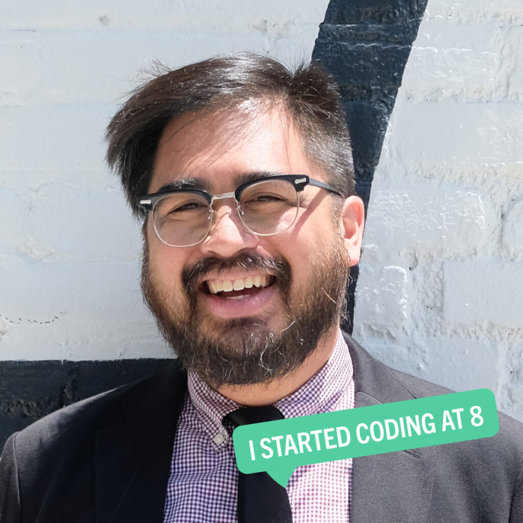 Portrait of Michael Nailat with a colorful tag displaying their fun fact "Started coding at age 8"