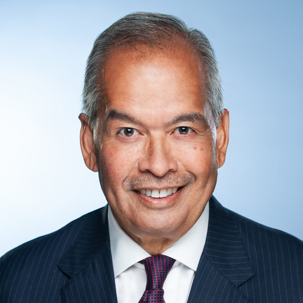 Headshot photo of Rudy Medina smiling