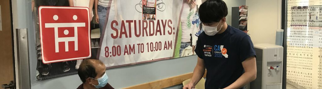 young man helping older man